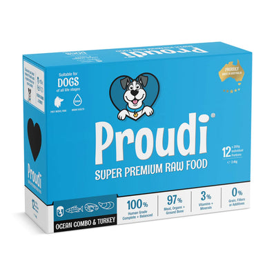 A blue box of Proudi Super Premium Raw Food for dogs, featuring Ocean Combo & Turkey patties. The packaging displays various certifications and product details.