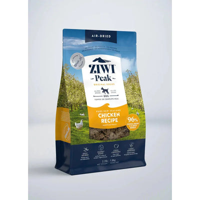 A package of ZIWI Peak Air Dried Free-Range Chicken Recipe dog food. The packaging is predominantly blue and yellow with an image of a dog and chicken in the background.