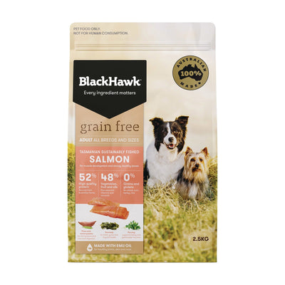 A package of Black Hawk grain-free Tasmanian salmon dog dry food with images of salmon and dogs, indicating the product is for adult dogs and is grain-free.