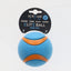 Blue and orange Scream dog toy with packaging on a light gray background