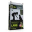 Dog food package with a silhouette of a person and dog, featuring lamb as the main ingredient.